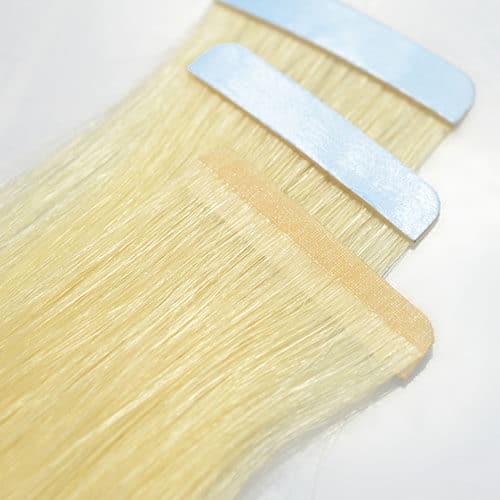 Blonde invisible tape-in human hair extension